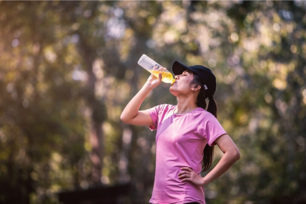 Lady drinking Electrolyte Water